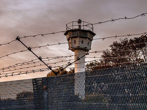 Watchtower and fence at the former German-German border in the border museum in Mödlareuth