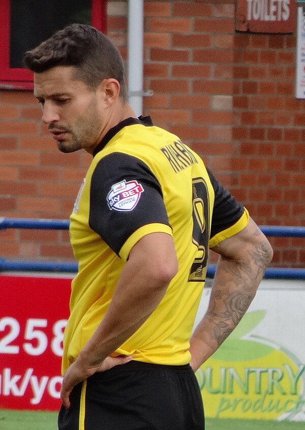 Richards playing for Northampton Town in 2014