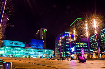 The MediaCityUK Plaza seen at night during the MediaCityUK Lightwaves Festival 2018 looking towards Dock10, the BBC and Salford University.
