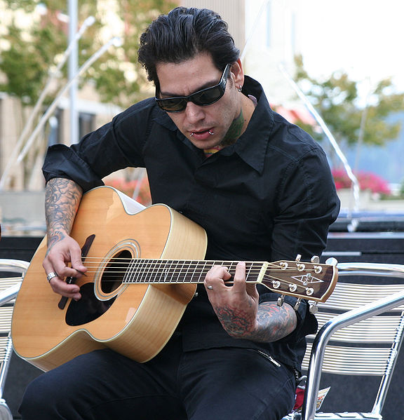 Band bassist Mike Herrera performing "Move to Bremerton" in 2006