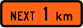 New Zealand road sign W1-1.1A (1 km).svg