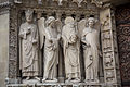 Emperor Constantine, an angel, Saint Denis holding his head, and another angel