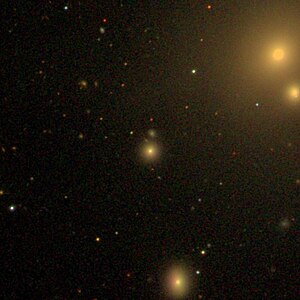 The galaxy NGC 387 surrounded by the galaxies NGC 383, NGC 382 and NGC 386 (clockwise), SDSS image