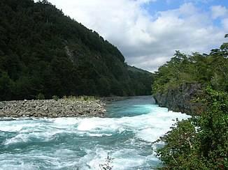 Narrow gorges and steep, densely overgrown bank slopes shape the upper reaches of the river