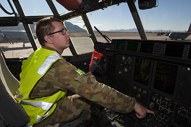 Ground crewman of No. 37 Squadron in a C-130J Hercules during a US exercise in February 2015