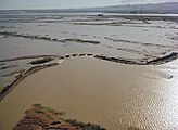 An aerial view looks south toward a levee breach on Van Sickle Island in early December 1983.