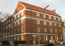 Facade of the eastern corner house at the intersection of Raulstrasse and Holzhauser Strasse