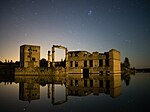 Remains of Rummu quarry utility buildings in the water at night on 5 September 2014.jpg