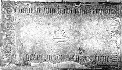 Ledger stone of Richard Chichester (d.1496), of Raleigh, Sheriff of Devon 1469 & 1475, floor of chancel aisle, Pilton Church, Devon. Text: Orate p(ro) anima Ricardi Chichester Armig(er)i qui obiit XXIIII die Octobri an(n)o D(o)m(ini) M(illensim)o CCCCLXXXXVIII (or CCCCLXXXXVI) cuius ani(mae) p(ros)picietur D(eus). ("Pray for the soul of Richard Chichester, Esquire, who died on the 24th day of October (Month much worn, December, per Vivian, Heralds' Visitations of Devon, p.172) in the year of Our Lord the one thousandth four hundredth and ninety eighth (sixth?) of whose soul may God look on with favour"). In the centre the letters "IHS" (J(E)H(ESU)S). It is of the same stone and in the same style with identical lettering to the slab of John Courtenay (d.1510) in Molland Church, Devon. RichardChichester1496PiltonChurchDevon.JPG