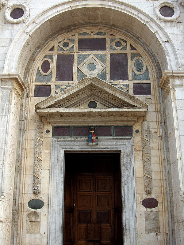 Doorway of the Malatesta Temple by Leon Battista Alberti.