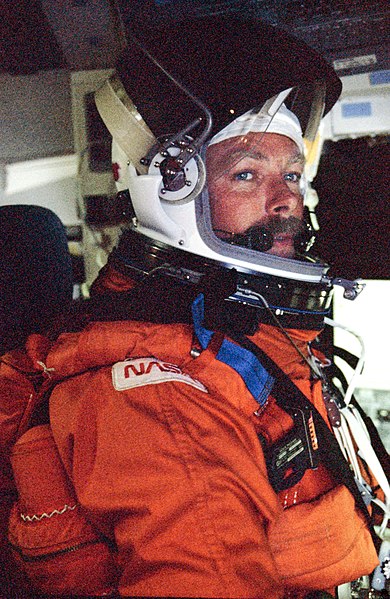 File:STS-27 crew activities Gibson wearing Launch Entry Suit and helmet.jpg
