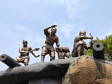 Statues of Ahom warriors in battle postures in Saraighat War Memorial Park Saraighat war memorial park statues.jpg