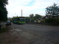 Southern Vectis 320 Brambles Chine (SN03 LDK), a Dennis Dart SLF/Plaxton Pointer 2 MPD, in Ventnor Road, Whitwell, Isle of Wight on route 6.