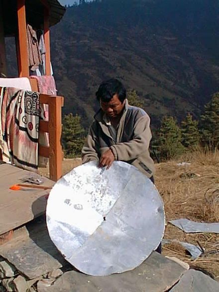 Mahabir Pun hand-making a satellite dish in Nepal