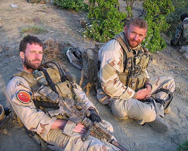 Michael Murphy (left) with Matthew Axelson, taken in Afghanistan