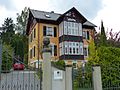 Villa with garden and two gates