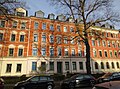 Apartment building in closed development with front garden