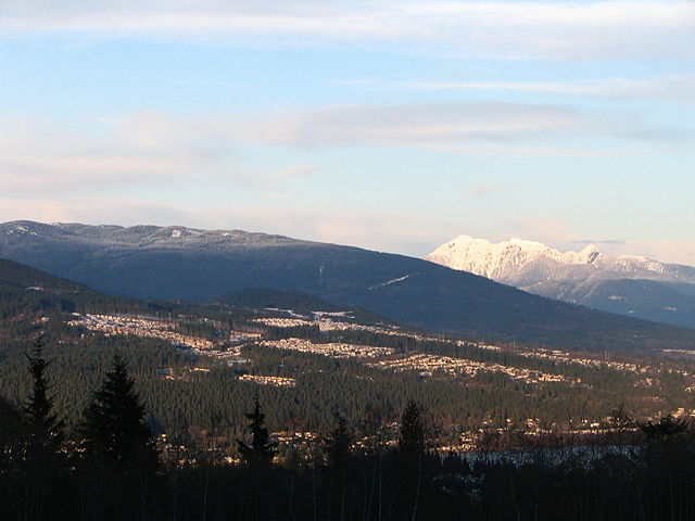 Westwood Plateau, with Burke Mountain behind it and Golden Ears Provincial Park in the distance