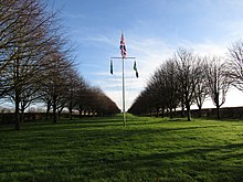 Southern Rhodesia Memorial Avenue in Norfolk; the pale blue Southern Rhodesia flag is flying on the left -2020-12-21 Southern Rhodesia memorial avenue, Southrepps, Norfolk.JPG