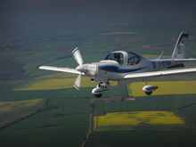 A No. 16(R) Squadron student pilot flies his first solo formation sortie in Grob Tutor T.1 G-BYWB, 2009.