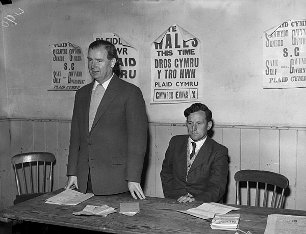 1959 election in Merioneth. Gwynfor Evans, standing, is talking at Bryncrug