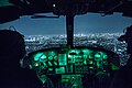 "459th_Airlift_Squadron_UH-1N_Huey_pilots,_fly_over_Tokyo_after_completing_night_training_April_25,_2016.jpg" by User:Elisfkc