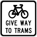 cyclists give way to trams