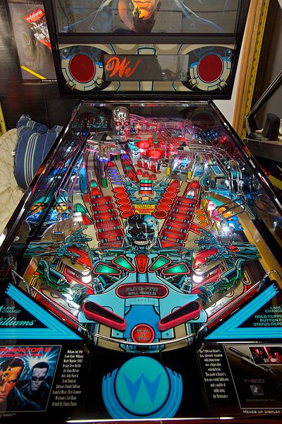 A restored Terminator 2 pinball machine with all metal parts plated with chrome