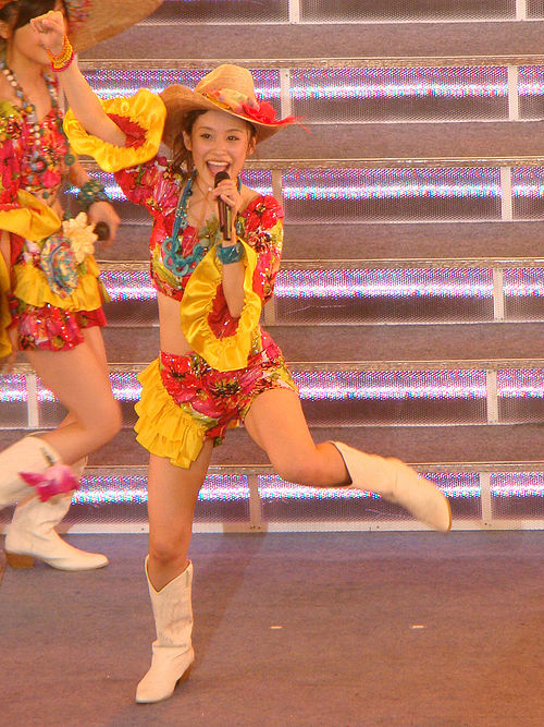 Ai Takahashi performing at Morning Musume's Platinum 9 Disc concert tour in May 2009.