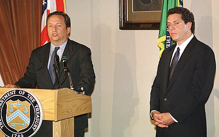 Cuomo as HUD Secretary holding a press conference with then Treasury Secretary Larry Summers in June 2000