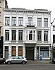 Burger- en winkelhuis in neoclassicistische stijl