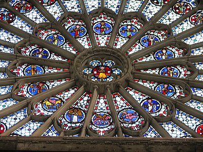 Rose window of the portal of libraries, north transept (15th c.)
