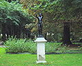 Statue of the "Worshipping Boy". Park side of the Casino