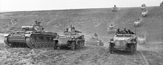 The classic characteristic of what is commonly known as "blitzkrieg" is a highly mobile form of infantry, armour and aircraft working in combined arms. (German armed forces, June 1942) Bundesarchiv Bild 101I-218-0504-36, Russland-Sud, Panzer III, Schutzenpanzer, 24.Pz.Div. (cropped).jpg