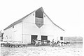 Caption- September 7, 1948. Kokomo, Indiana. Emmanuel Hochstetler and some of his Holstein cattle. (8715819672).jpg