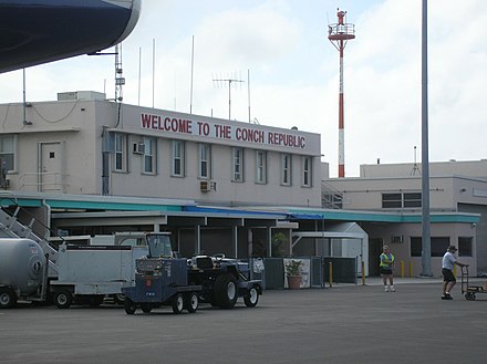 "Welcome to the Conch Republic", a sign at Key West International Airport.