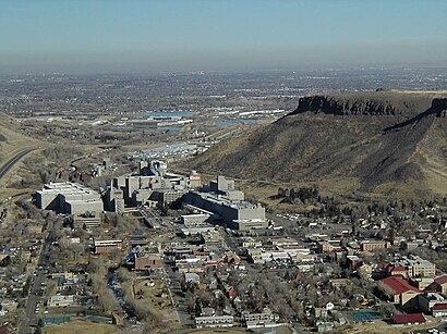A color photograph showing the cityscape of Golden, Colorado, prominently showing the Coors brewing facility