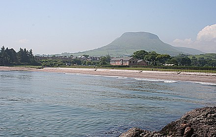 Cushendall Beach as seen from the Salmon Rocks, with Lurigethan in the background.