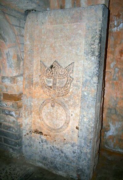 Late Han stone-carved Luoyang tomb door, representing a door knocker with a taotie face motif, common in ancient Chinese art.