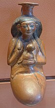 Vaso egizio antropomorfo, Museo del Louvre, Parigi.