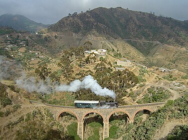 Eritrean Railway, that now connects only Massawa and Asmara, showing a class 440 locomotive at work on the mountainous section between Arbaroba and Asmar Eritrean Railway - 2008-11-04-edit1.jpg