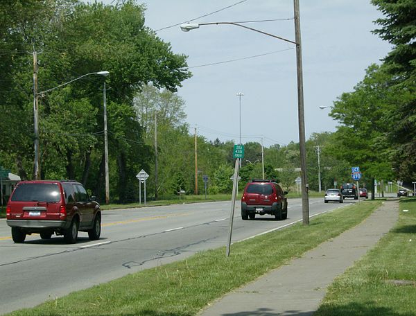 Looking west on NY 31F just east of I-490 in Pittsford. The reference marker alongside the road erroneously reads "253" for NY 253