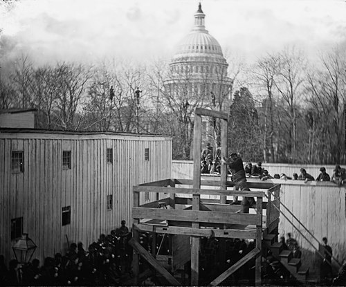 The execution of Henry Wirz in 1865 near the U.S. Capitol; Wirz was given a standard drop, which did not break his neck