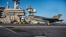 A VFA-125 F-35C lands on USS Carl Vinson on 18 October 2017. F-35C Lightning II of VFA-125 lands on USS Carl Vinson (CVN-70) off Southern California on 18 October 2017 (171018-N-BL637-0024).jpg