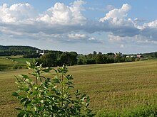 Rolling farmland on the shoulders of North Bluff north of Willard Farmland in Hendren Clark County Wisconsin.jpg