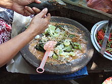 A traditional Indonesian way of making gado-gado. Gado gado ulek.jpg