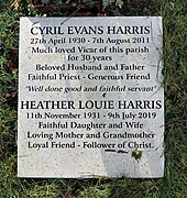 Grave in Churchyard of St Giles Stoke Poges of Revd Cyril Evans Harris - vicar of Stoke Poges and his wife Heather.jpg