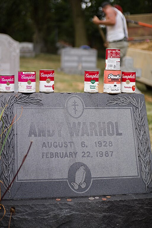 Grave of Andy Warhol festooned with soup cans