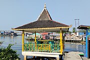 Banjar: Bagian luar Kubah Habib Hasyim bin Muhammad in Ahmad bin Abdurrahman Al-Kaff di pinggir Sungai Awang-Sungai Martapura, Sungai Jingah, Banjarmasin, Kalimantan Salatan. Bahasa Indonesia: Bagian luar Makam Habib Hasyim bin Muhammad in Ahmad bin Abdurrahman Al-Kaff di tepi Sungai Awang-Sungai Martapura, Sungai Jingah, Banjarmasin, Kalimantan Selatan. English: The outside of the Tomb of Habib Hasyim bin Muhammad bin Ahmad bin Abdurrahman Al-Kaff on the banks of the Awang River-Martapura River, Sungai Jingah, Banjarmasin, South Kalimantan.