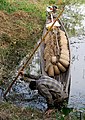 Positioning eel traps in Inle Lake.